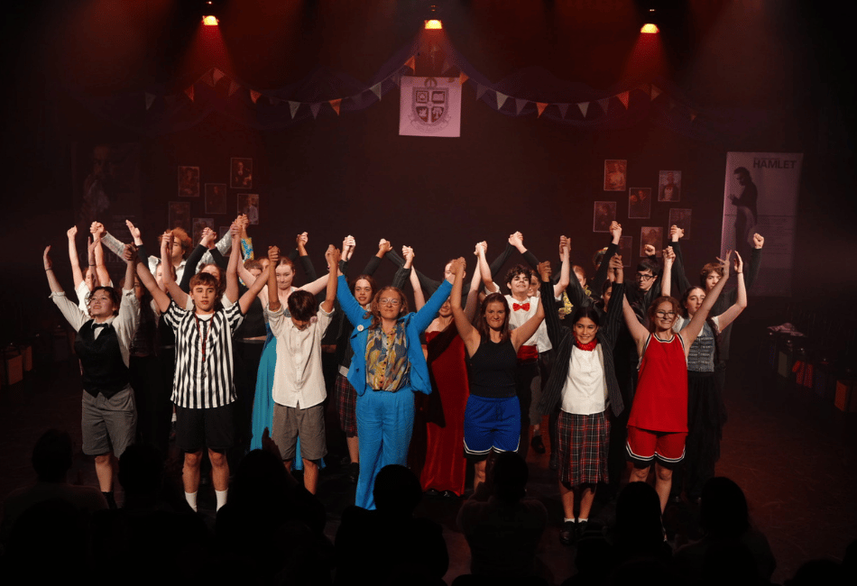 A photo showing the entire cast of The Shakespeare Project taking a bow at the conclusion of a performance